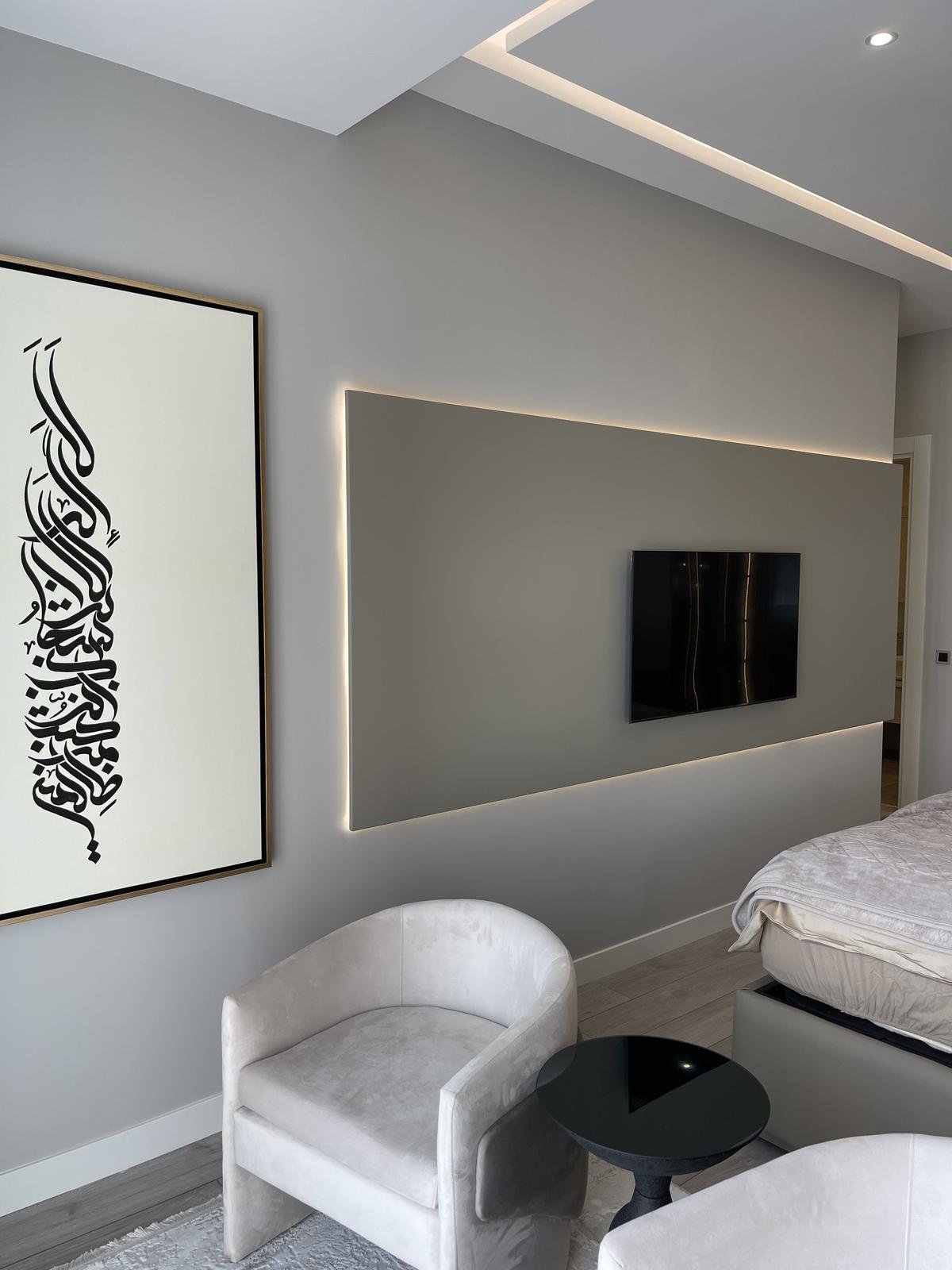TV wall unit with wood paneling and LED backlighting